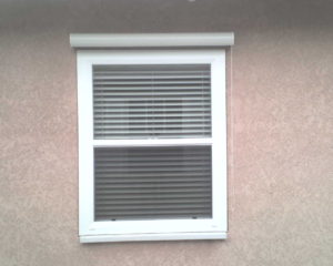 a window with blinds on it.